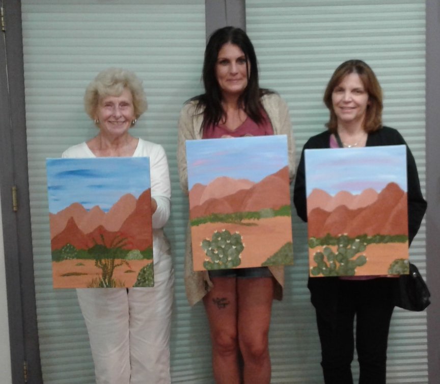 Gals painting a canvas for the first time in Sedona